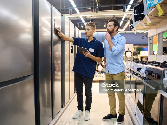 Our expert sales representative helping a customer with appliances